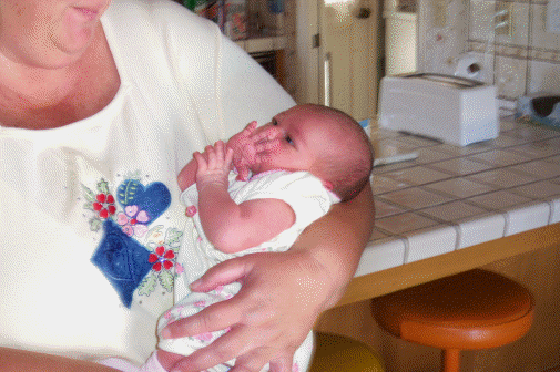 She just won't let anyone else hold me!