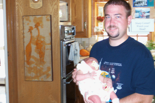 Uncle Kevin is holding me