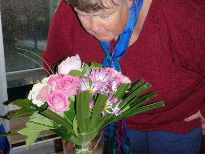 Katie smelling the flowers