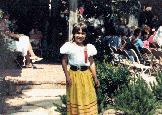One of the fiesta flower girls